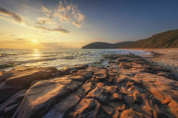 Pier in Maremma coast. Sunset time. Mediterranean sea Marina di Cecina, Tuscany, Italy Europe.